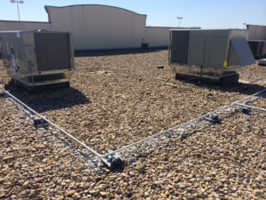 Commercial A/C units on roof of building