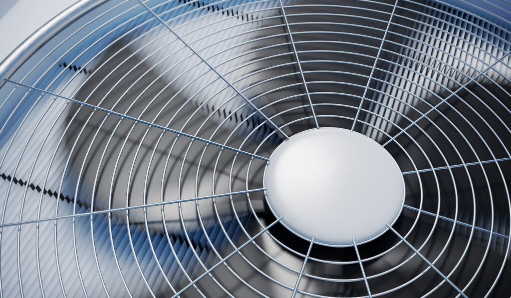 Close up view of the fan on an air conditioning unit